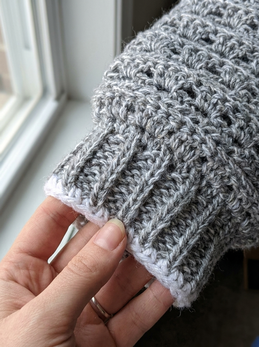 Dewdrop Vale Crochet Sweater Pattern - close-up of crochet stitch texture and white trim
