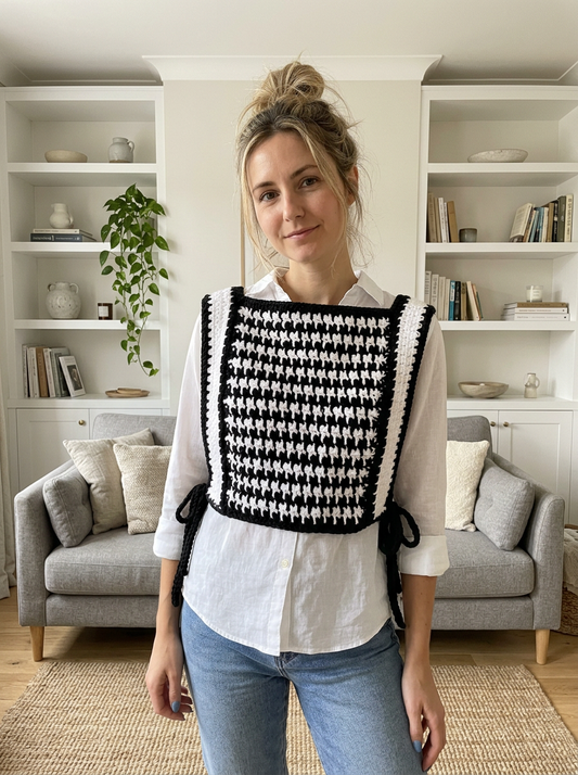 Yew Garden Crochet Vest Pattern - woman wearing the black and white houndstooth crochet vest, front view